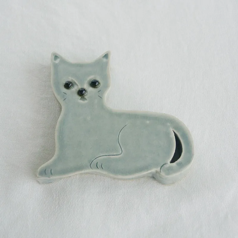 猫の陶板作品。